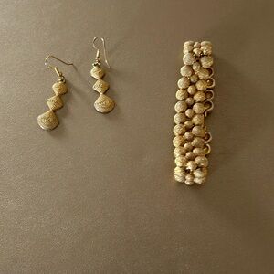 Gold matching bracelet and earrings